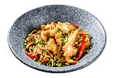 Stir-fry Glass noodle with chicken fillet and vegetables.   Isolated on white background. Top view.