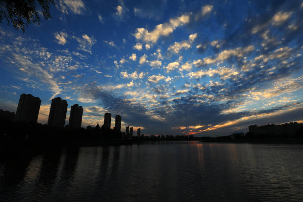 istock Evening scenery of waterfront city, North China 1987466507