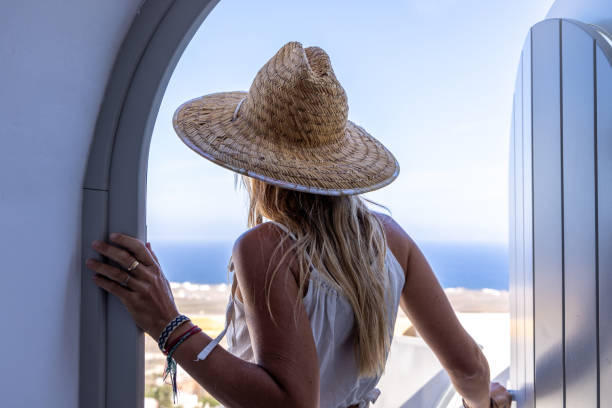 istock Woman discovers her private villa rental 1987469734