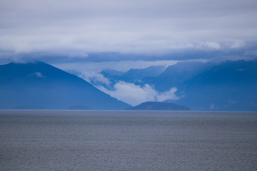 It's all mountain and clouds and sea in this August taken shot just off the coast of Alaska.