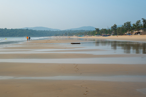 Agonda, Goa, India, 15th of December 2023, Seascape with a peninsula and a sandy beach,