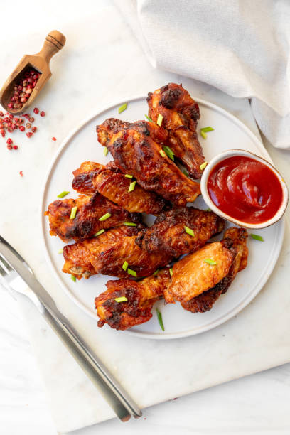 istock Spicy chicken wings in bbq sauce 1987531286