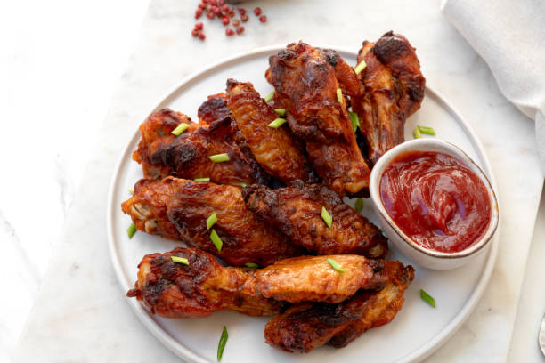istock Spicy chicken wings in bbq sauce 1987532363