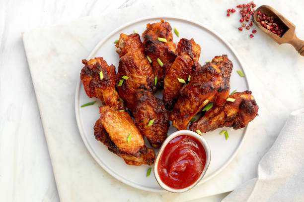 istock Spicy chicken wings in bbq sauce 1987532384