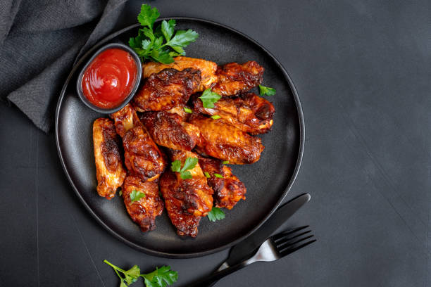 istock Spicy chicken wings in bbq sauce 1987532743