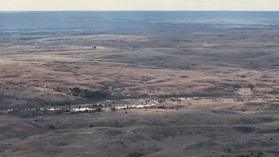 An aerial view of a vast landscape with bushes