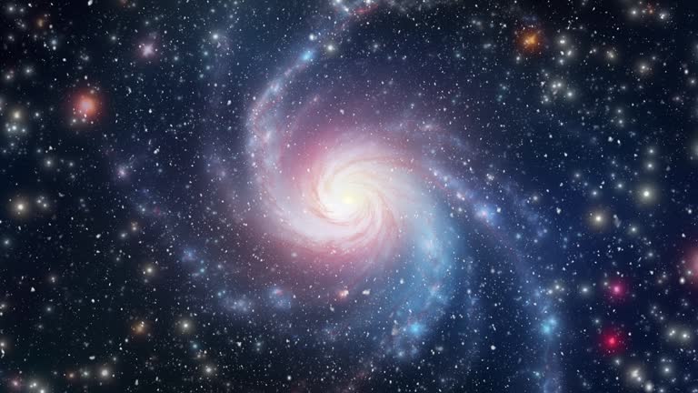 A vibrant footage showcasing the beauty of a spiral galaxy surrounded by stars in the cosmos.