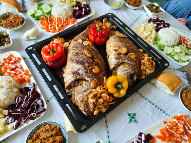 Roasted tasty fish and vegetables on Traditional moroccan table, Delicious fried fish