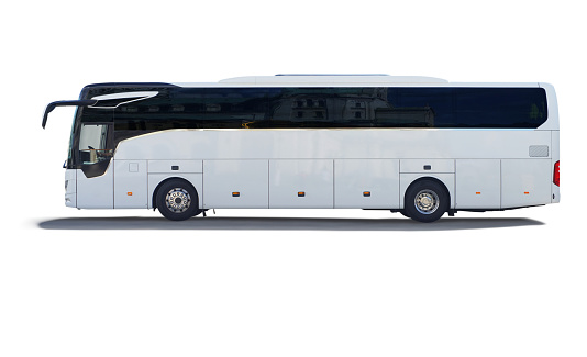 A white tour bus isolated on white background with a drop shadow.