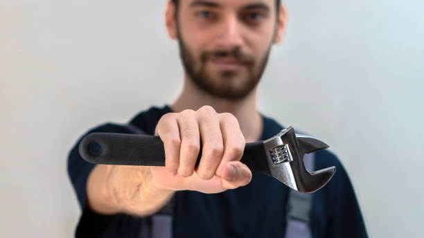 istock repairman at auto service 1987620672
