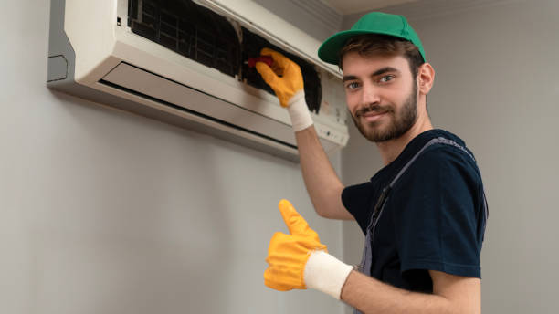 istock air conditioner repairman working 1987624416