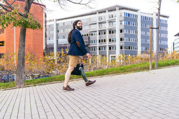 istock Entrepreneur with Prosthetic Leg Walking Confidently in Urban Area 1987626580