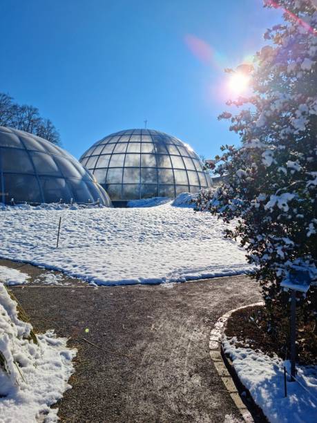 Frankfurt, Germany - April 15, 2015: entrance building of the  palmengarten in Frankfurt, Germany. The Palmengarten is one of two botanical gardens in Frankfurt and the largest garden of its kind in Germany.