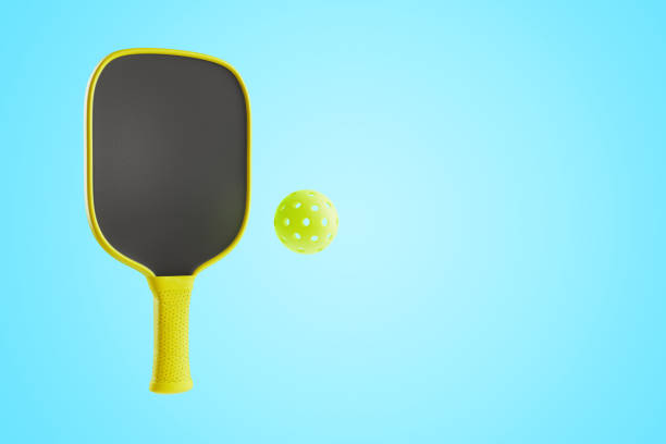 istock Pickleball racket and sports ball. 3d rendering 1987629302