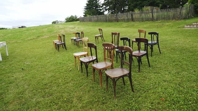 Old wooden chairs at the wedding ceremony
