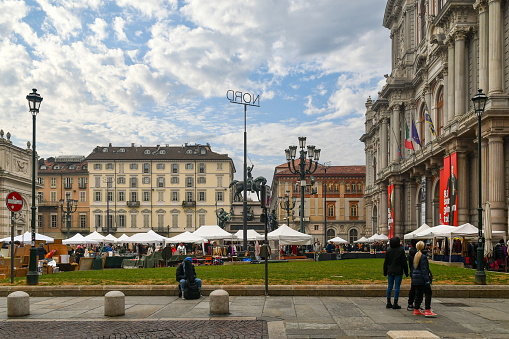 Turin, Piedmont, Italy - 12 09 2023: Piazza Carlo Alberto is one of the historic squares in the center of Turin, overlooked by Palazzo Carignano and the National Library of Turin.