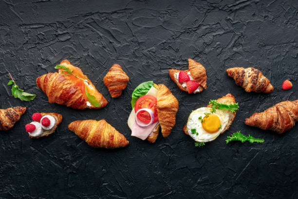 istock Croissant sandwich variety. Different stuffed croissants, top shot 1987647004