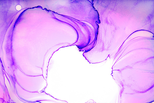 Natural abstract fluid art painting with alcohol ink technique. Soft dreamy colors create transparent wavy lines.