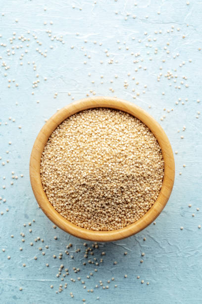 istock Quinoa in a bowl, healthy organic wood, uncooked 1987651235