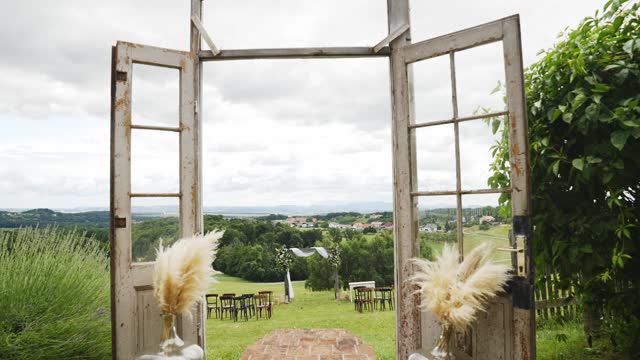 Wedding ceremony on the hill surrounded with nature