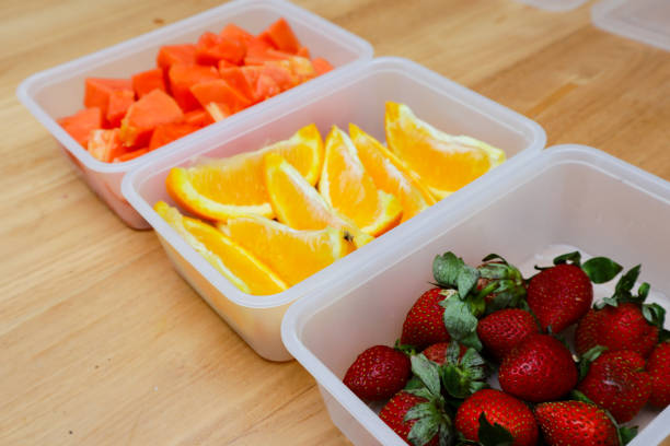 THREE STRAWBERRIES AND HALF A TANGERINE