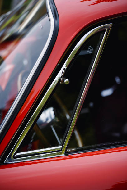 istock Side window of a vintage classic car 1987696740