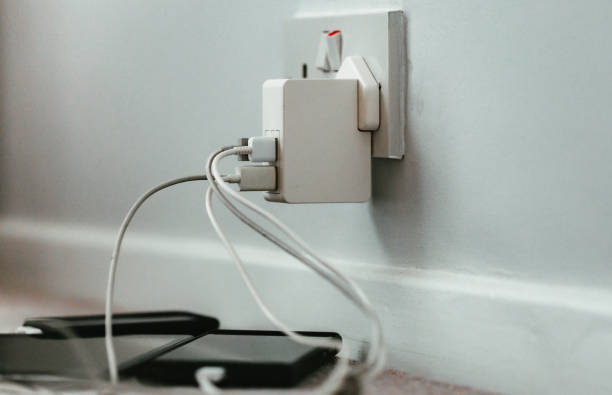 istock Selection of digital devices charging at home 1987709351