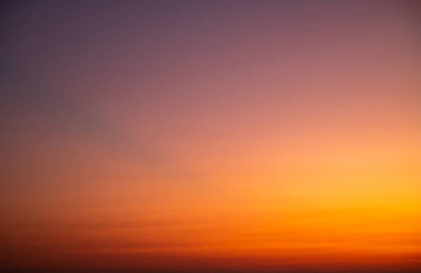 istock Beautiful , luxury soft gradient orange gold clouds and sunlight on the blue sky perfect for the background, take in everning,Twilight, Large size, high definition landscape photo 1987723657