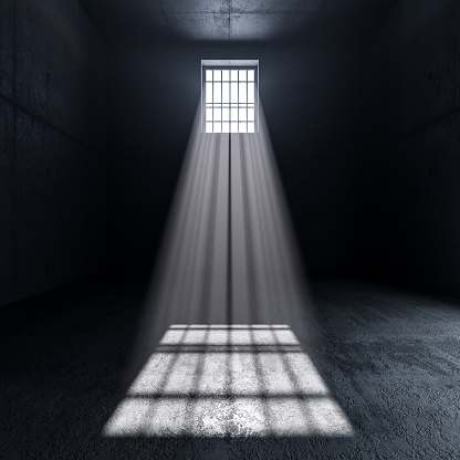 inside a prison, light coming from a window with bars. 3d render