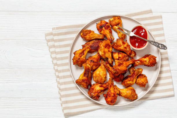 istock spicy crispy grilled chicken wings, top view 1987744398