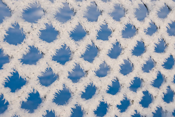 Closeup of cracked ice texture indoors.