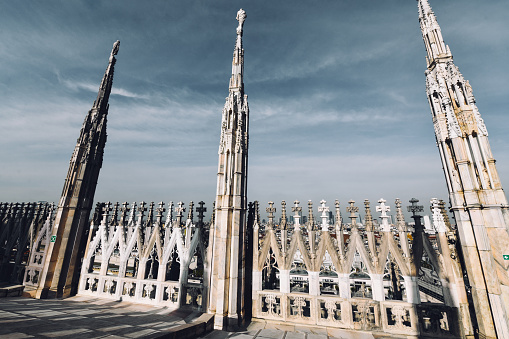 Fence And Statues Of Duomo Rooftop In Milan, Italy