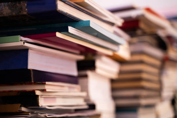 istock A large pile of books is stacked on a blurred background 1987755537