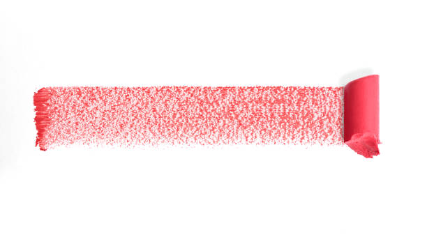 istock Red color lipstick stroke on white  background, isolated. Top view 1987771445