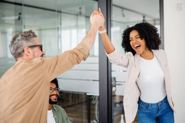 istock A high-five moment captures the joyful success within a team 1987789307