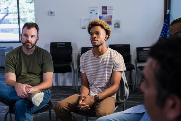 istock Diverse, multigenerational group of male vets meet for support group 1987823923