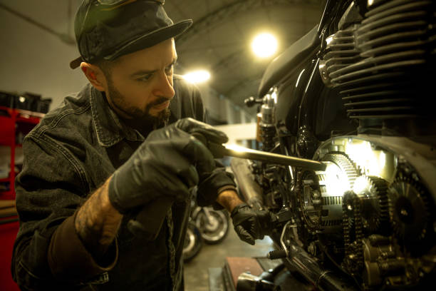 istock Mechanic working on a motorbike 1987848052