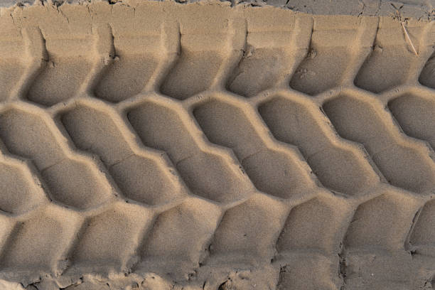 Traces of equipment on the sandy beach
