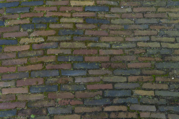 Textures of various options for laying paving stones on old roads in Europe