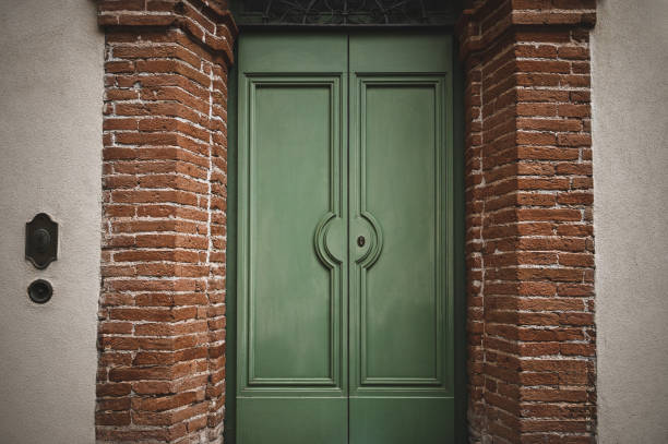 front view of antique doors in Italy.