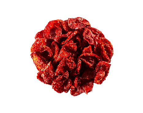 Dried tomatoe with copy space for text. Dried tomatoe isolated on a white background. Dried bunch of tomatoe on white background.