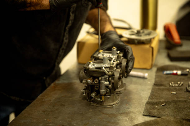 Mechanic repairman work on motor