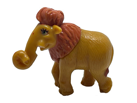 Mammoth wild animal. Mammoth toy. Photo a toy mammoth on a white background