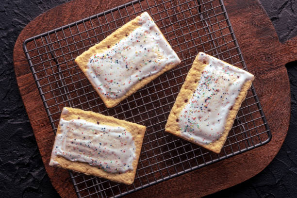Pop tarts on a baking rack. Poptart toaster pastry with icing