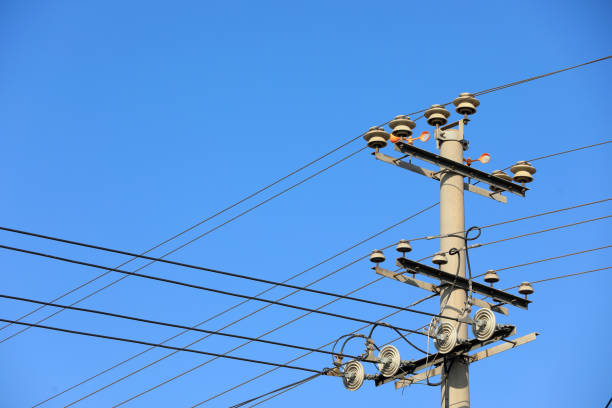 istock Power transmission equipment in blue sky background 1987917915