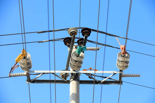 istock Power transmission equipment in blue sky background 1987918971