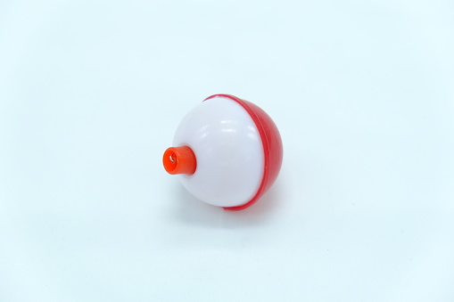 This is a fishing bobber on a white background.