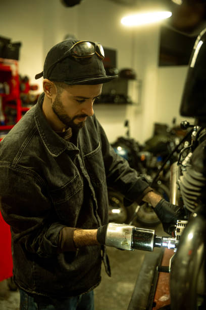 istock Mechanic working on a motorbike 1987936202