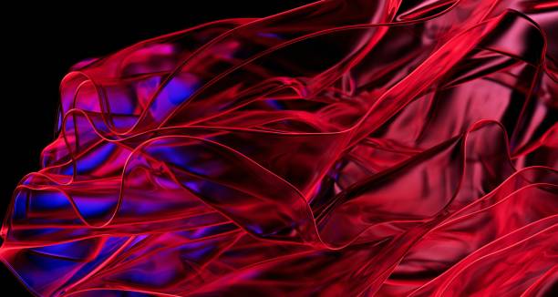 istock Red and blue glass waves flow in an elegant dance against the black backdrop. 1987942163