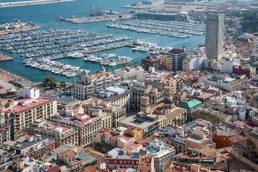 Community of Valencia, Spain - April 20, 2018: Aerial photo of the city and port of the city of Alicante, from the castle of Santa Barbara
